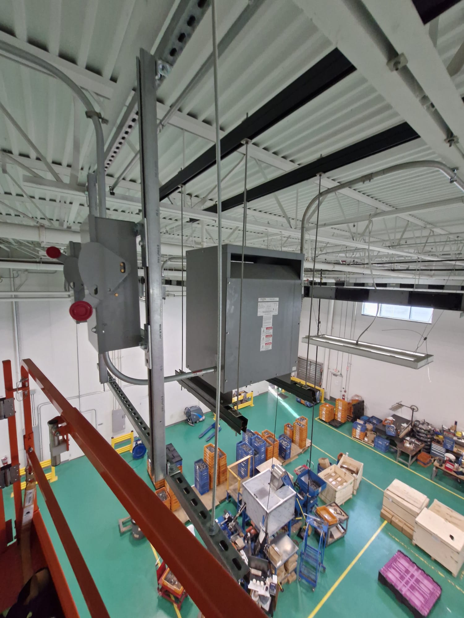 Overhead electrical system in warehouse